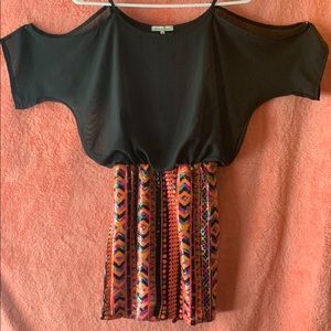 Adorable off the shoulder dress.